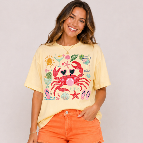 Woman wearing a yellow t-shirt with a colorful graphic design on a plain background